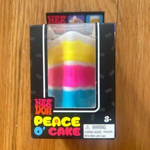 Peace O' Cake Sensory Toy - Yellow, Pink, Blue